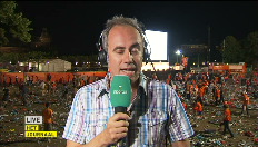 Eddy Demarez staat in Amsterdam