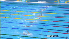 Kimberly Buys in de reeksen van de 100m rugslag
